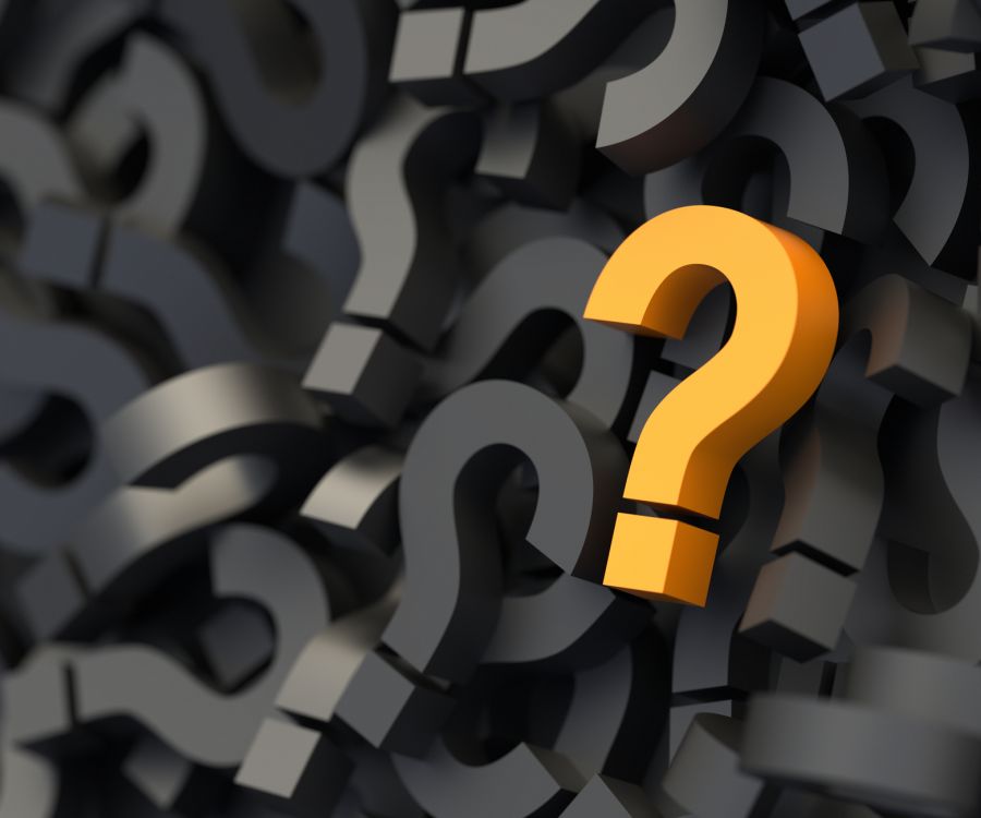 Image of one golden question mark sitting atop a large mound of black question marks