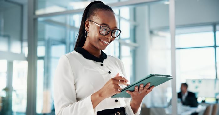 Person reviewing workforce information on a tablet